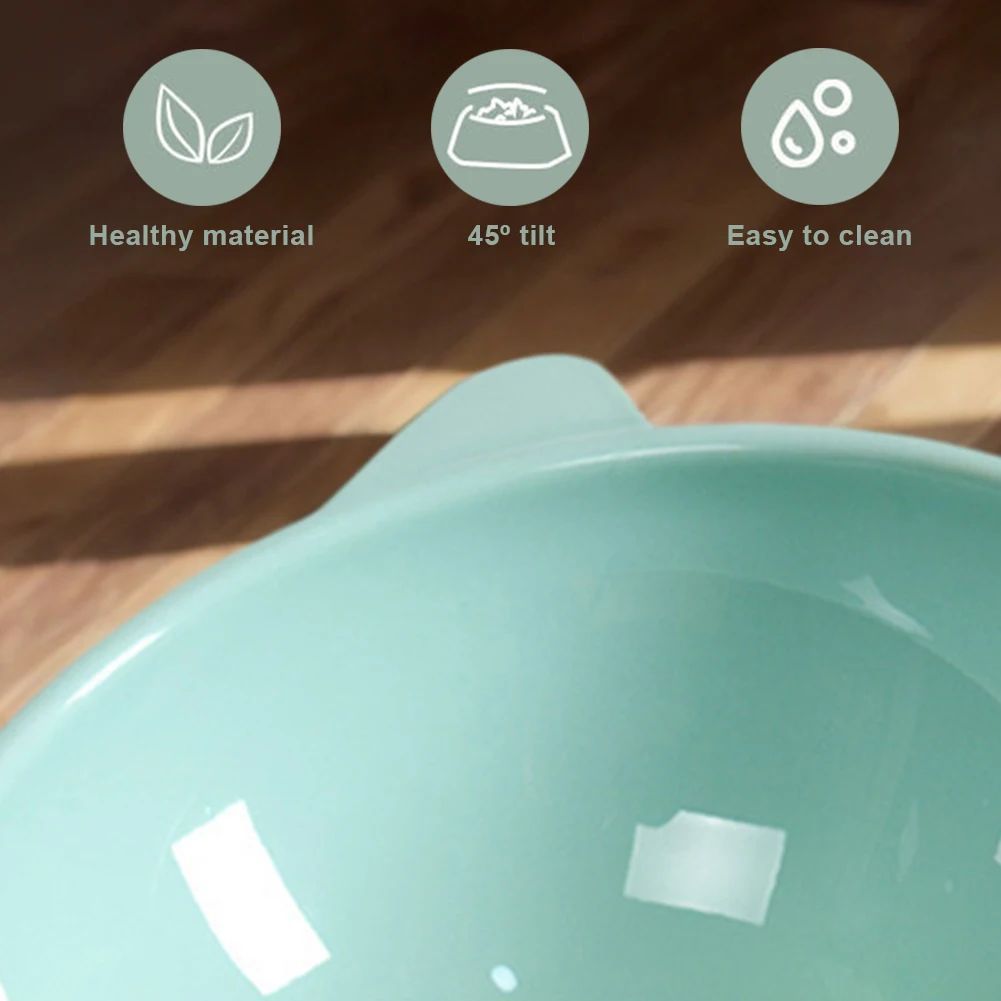 Tilted elevated cat food bowl with raised base, view 7