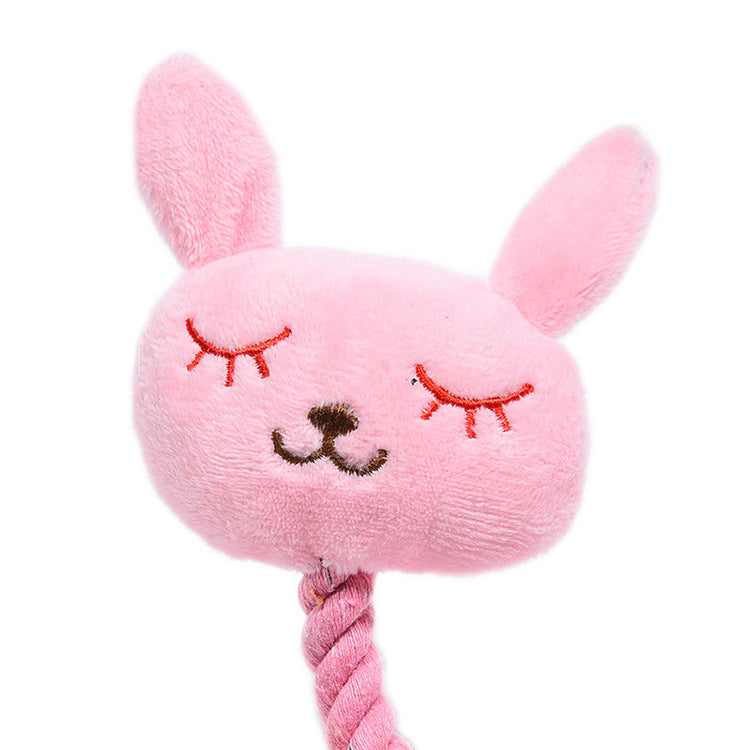 Squeaky plush pink bunny and green frog puppy toys, view 9