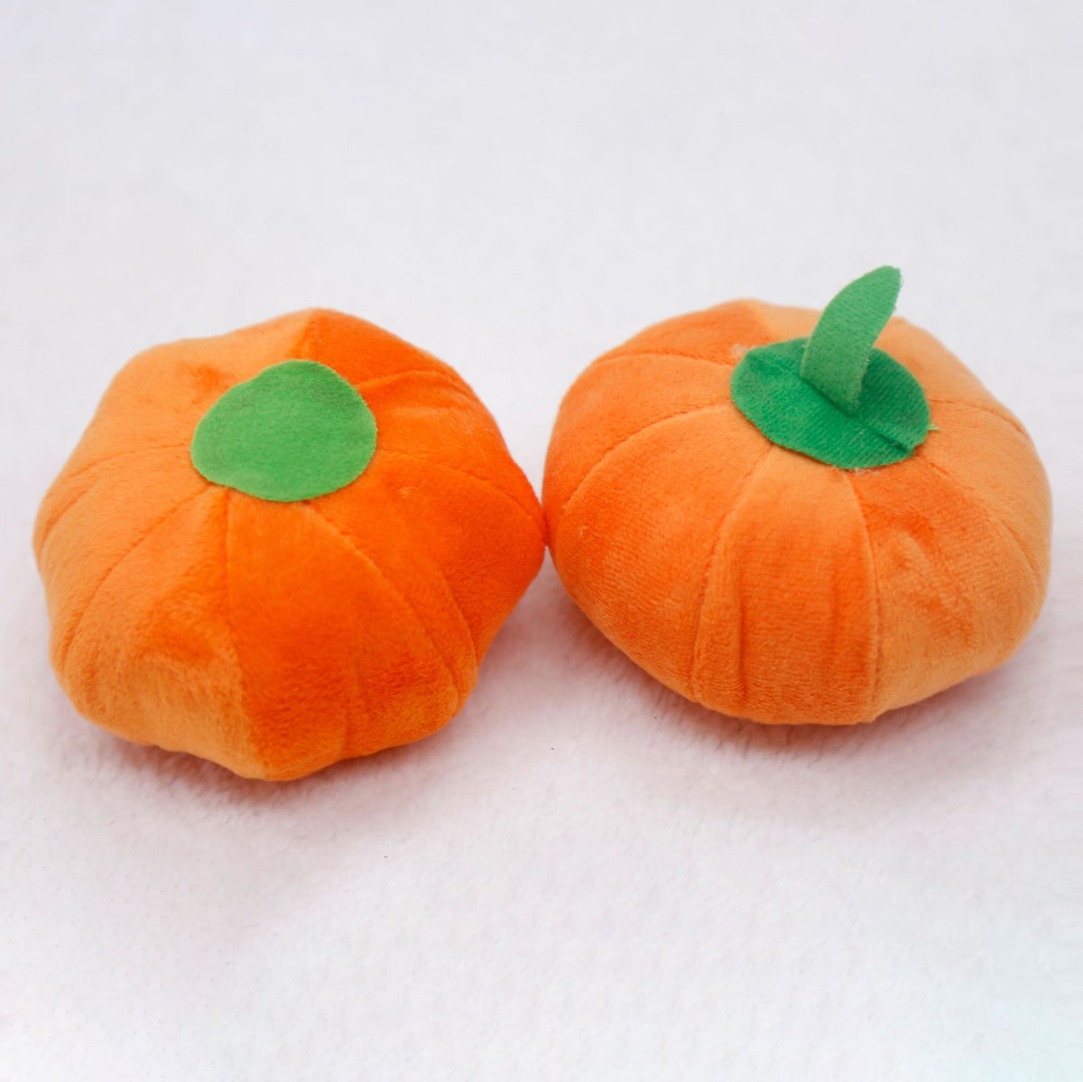 Small squeaky orange pumpkin plush dog toy, view 5